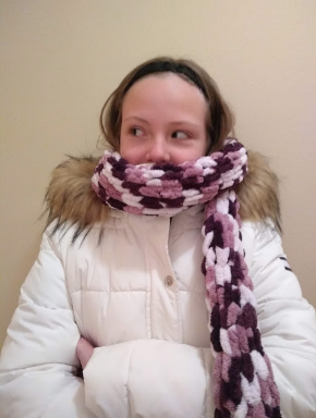 My 7th grade sister, Julia Burkholder, poses in a scarf made of Loop Yarn.
