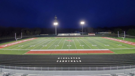 The stadium lights lit at Middleton High School. The stadium has not been full since March due to the pandemic.  