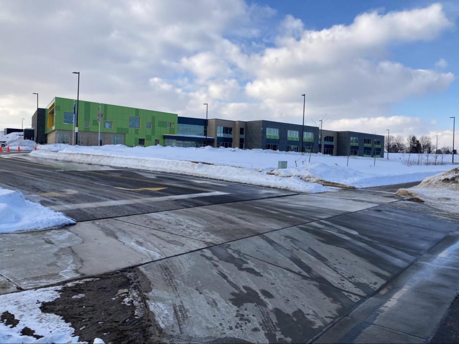 Construction of Pope Farm Elementary School (above) was completed in 2020, but students had not been in the new building until hybrid instruction began two weeks ago.