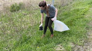 Me in May 2020, picking up trash and recyclables around my neighborhood. If I had not done this, they would have ended up in mass landfills, local bodies of water, or harming animals. This still occurs every day.