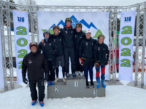 MHS Boys Ski Team takes on State with another successful season. From left to right: Coach Bryan Feltz, Jude Kunkel (11), Griffin Ward (12), Nathan Shaw (12), Alex Seaborg (12), Zach Ostreng (12), Owen Winkelmann (9). Not pictured: Will Seaborg (9).