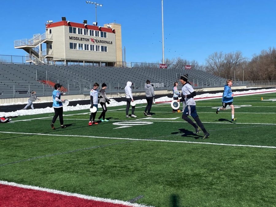 Members of the boys Ultimate team practice drills on the MHS football field. Currently, players practice on Sundays, but once the league starts, they will practice 3-5 times a week.