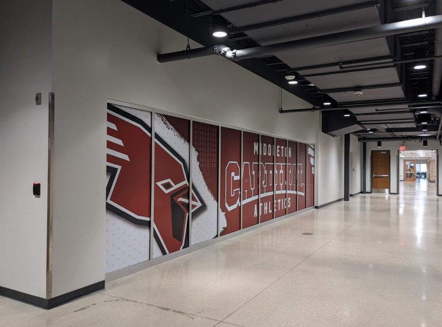 The new athletic hallway features a massive wall mural filled with pictures of Middleton High School students in their numerous athletic endeavors. For both Middleton students and teams from other schools, the hallway provides easy entrance to locker rooms, weight rooms, gyms and other amenities. 