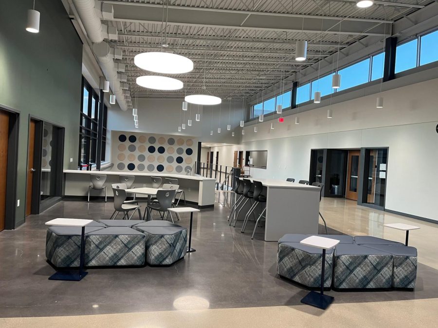 Outside the library and near several classrooms, students have collaboration space to spread out in during work time. 