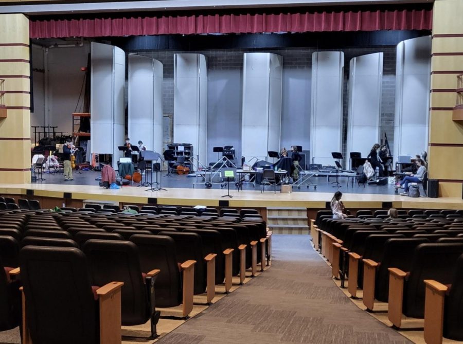 Between performances and checking the updated score sheets, many students killed time in one of the four practice rooms. The orchestra warm up room was the stage of the Performing Arts Center.