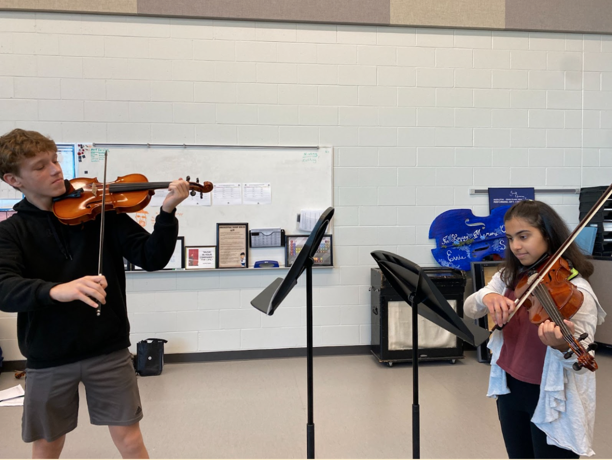 The members of Chamber Music Club, which meets every Friday morning at 7:15, practice in their ensembles.