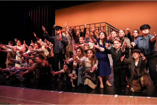 The cast of Middleton Theatre’s “Urinetown” reaches out to the audience after an amazing show. This show, with its many amazing leads and ensemble, brought new and marvelous images to the stage.