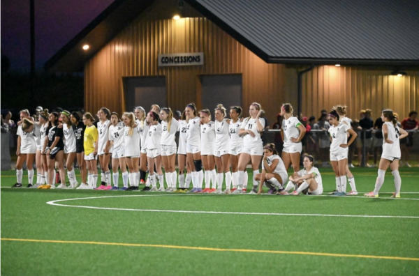 MHS Girls Soccer team stands tall after a 2023 game. Many are looking forward to the upcoming season.
