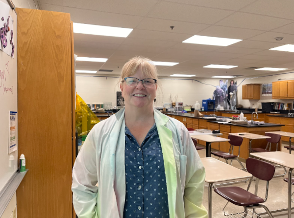 Mrs. Blackmore, posing in her classroom (1818) located in the Stack. This classroom has seen all kinds of students through the years.