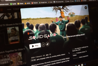 A picture of Squid Game on Netflix, featuring the infamous game of red light, green light.