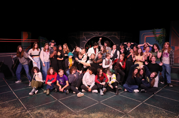  MHS Theatre's dazzling group photo. The cast and crew beams with excitement as they prepare to enthrall audiences.