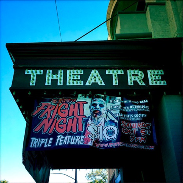A picture of a movie poster outside of a theater. There are many great horror movies for you to watch this Halloween! 
Photo by Kevin Dooley, licensed under CC BY-SA 2.0 (https://creativecommons.org/licenses/by/2.0/).