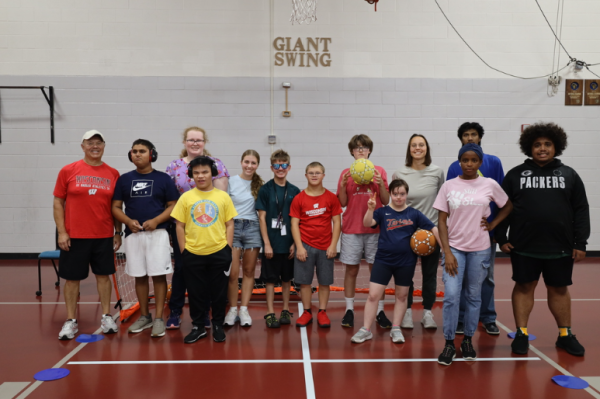 Players from left to right: Aarav Gandhi, Jacob LaBissoniere, Ezra Burger, Coleman Bray, Buddy Willix, Josie Lee, Fatima Jalloh, Arnav Kakade, and David Chang. Also pictured: Coaches Jessica McIntosh and Kevin Bavery.